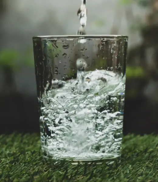 Water pouring in glass Water pouring in glass